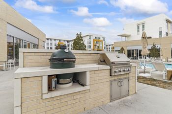 Outdoor gas grill and big green egg